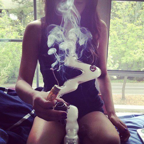 Hot chick takes a bong