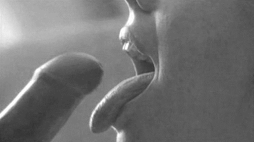 Smiling teen getting shot with cum