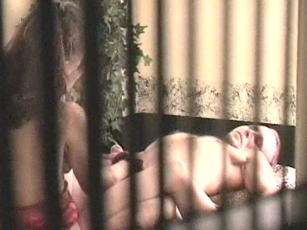 Girl giving man a hand job gets recorded from outside the window