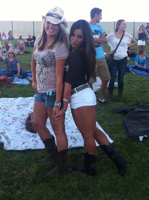 two sexy country girls at a concert