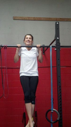 sexy girl in yoga pants showing off sexy legs while working out