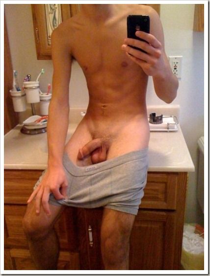 Pulling down his boxers in the bathroom