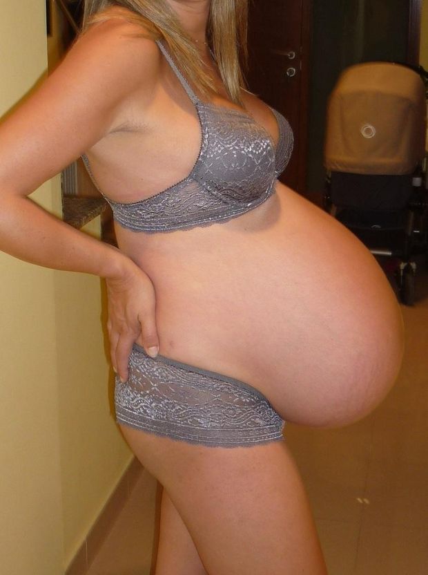 Big Pregnant Belly on Sexy Blonde