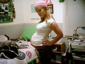 Pregnant Teen in Bedroom