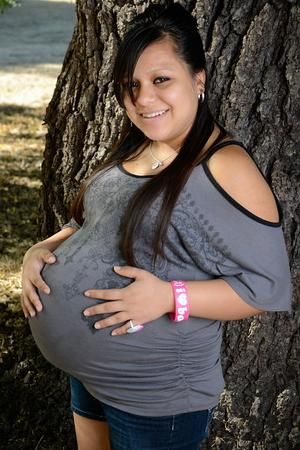 Big Pregnant Bellied Latina