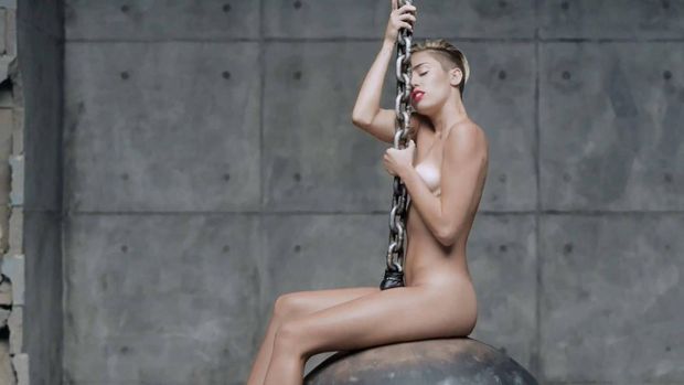 Miley Cyrus Gets Fully Nude To Straddle Wrecking Ball In Video