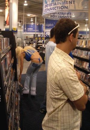 Visible thong at the video store ... hello, guys ... the videos aren't that exciting