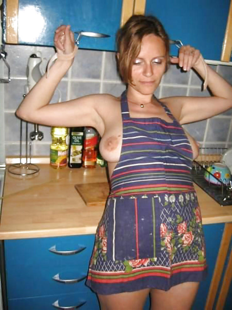 Better than sideboobs â€¦ both tits pop out of her apron â€¦