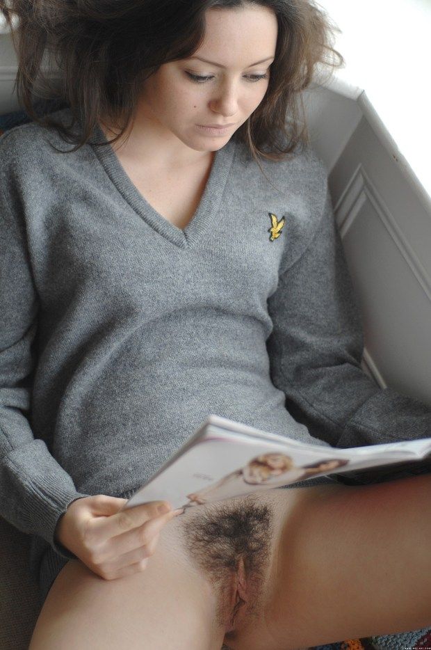 My wife style at a B&B reading next to a window!