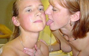 mom cleaning cum off of daughters face