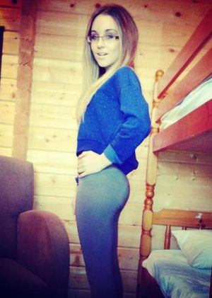 cute geeky girl with an amazing ass in leggings