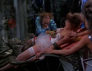 girl captured, panties taken down, her pussy is licked by octopus with 10 inch tongue