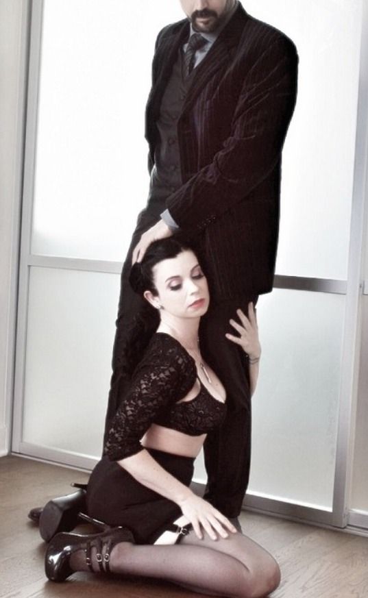 at his feet