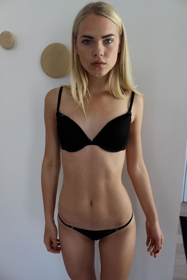 Skinny young & petite model in lingerie