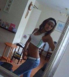 young latina in tight jeans selfshot