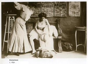 Two ladies distrubuting a spanking from victorian era.