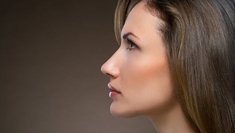 Stock image of woman with pointy nose