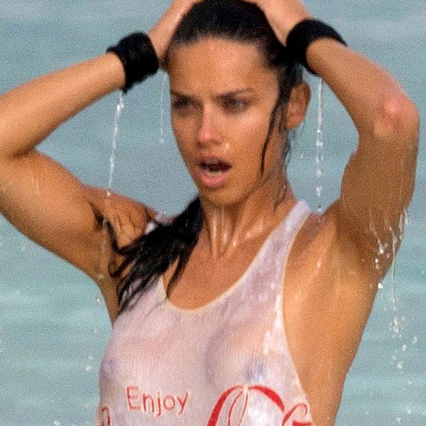 Adriana Lima nude tits under see thru wet top