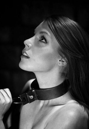 Pretty girl with a collar.