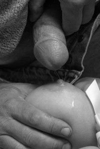Rubbing your nipple against the head of my cock until precum starts to drip down your breasts.