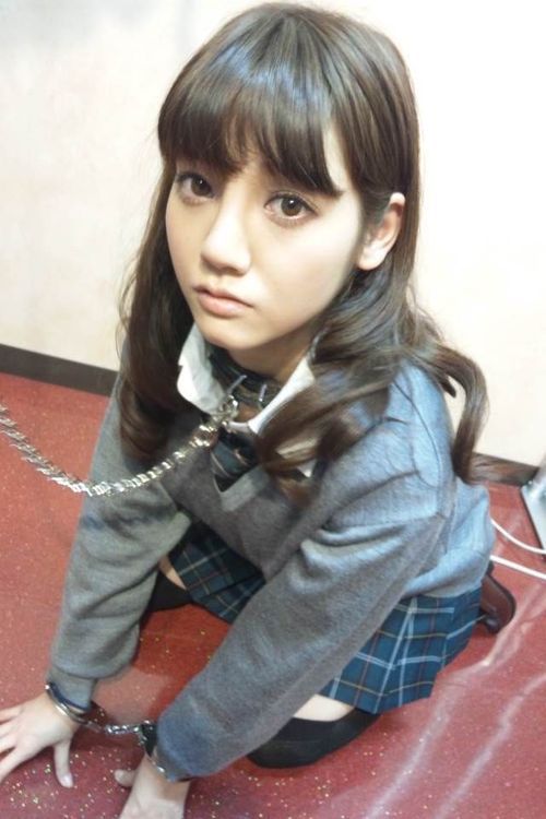 Beautiful asian student collared