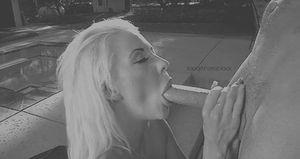 Getting both hands and her mouth involved