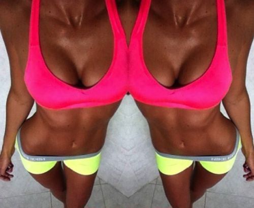 Hot ebony 'twins' in sports kit