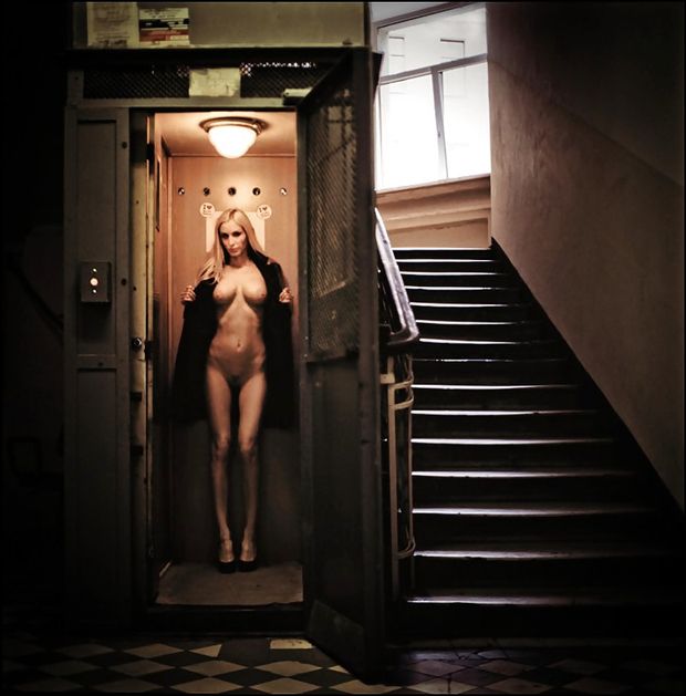 blonde exhibitionist woman in elevator