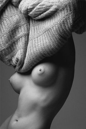 Nice breast hiding in sweater