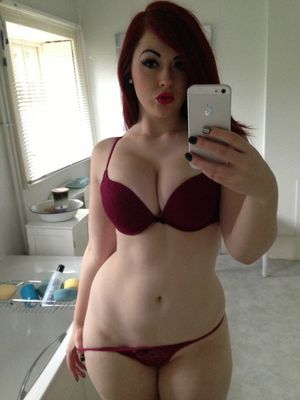 big tits red head in lingerie