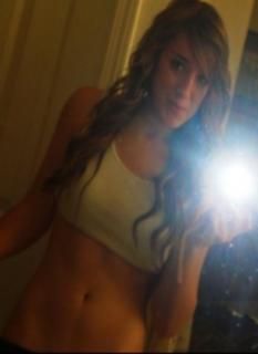 sexy slut in sports bra selfie