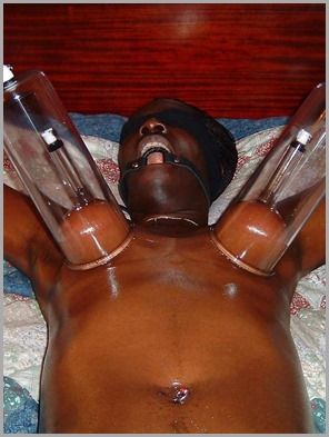 Black Tits and Nipples Sucked by a Machine