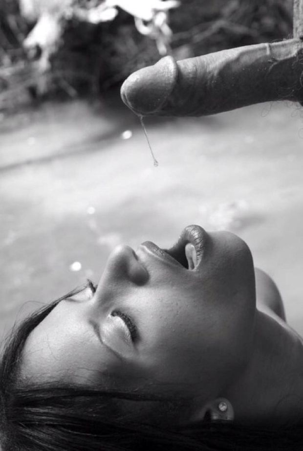 Waiting for it to drip in her mouth