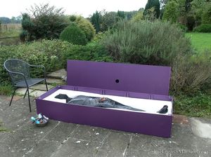 Slave in the bondage sendep box, awaiting his fate