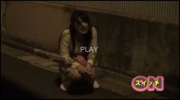 Asian flasher is caught sitting alone on the road side