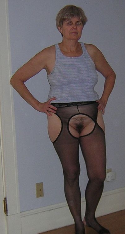Housewife posing in black open crotch pantyhose. Submission...