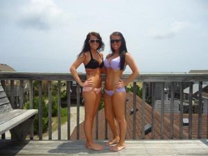 sexy sluts showing off bodies in their tight swimsuits