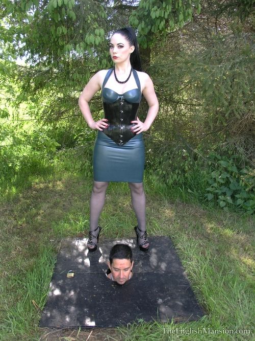 Slave buried in the garden and used as Mistress sees fit.