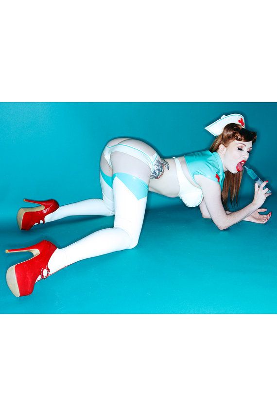 Latex nurse doggy position
