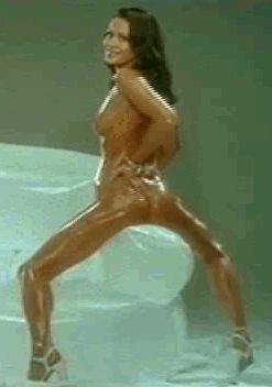 Eva Roberts is oiled up and that gave her an orgasmic effect when she straddled that chair arm