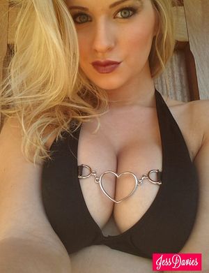 Close-up photo session of steaming huge juicy boobs of exquisite blonde stunner Jess Davies