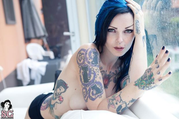 blue haired tattooed girl, cute.