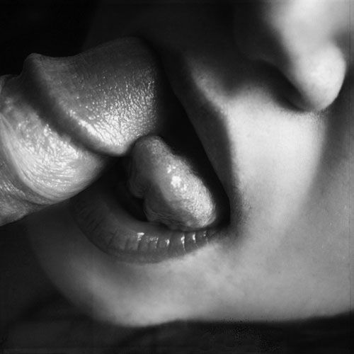 sexy lips and tongue licking the tip