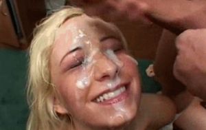 Blonde get's her face absolutely covered in cum.