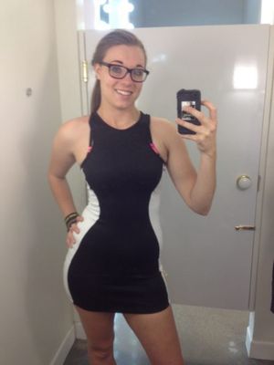 Hot Girl With Glasses Wearing a Skin Tight Dress
