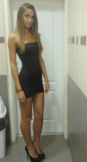 Hot Blonde in a Short Black Dress