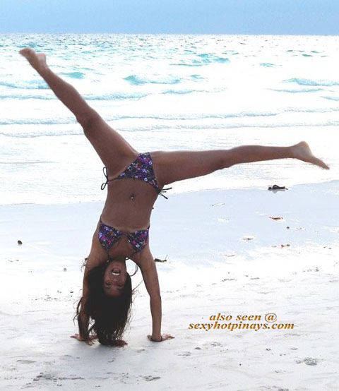 Aubrey Miles does a very hot cartwheel.