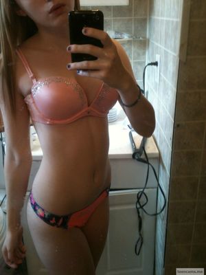 Cute teen shows off her body