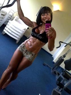 sexy fitness asian girl makes a selfie