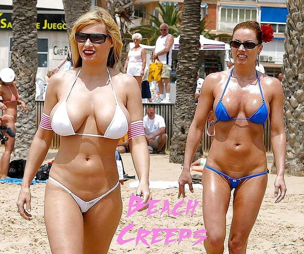 2 hot milfs strut their stuff on the beach